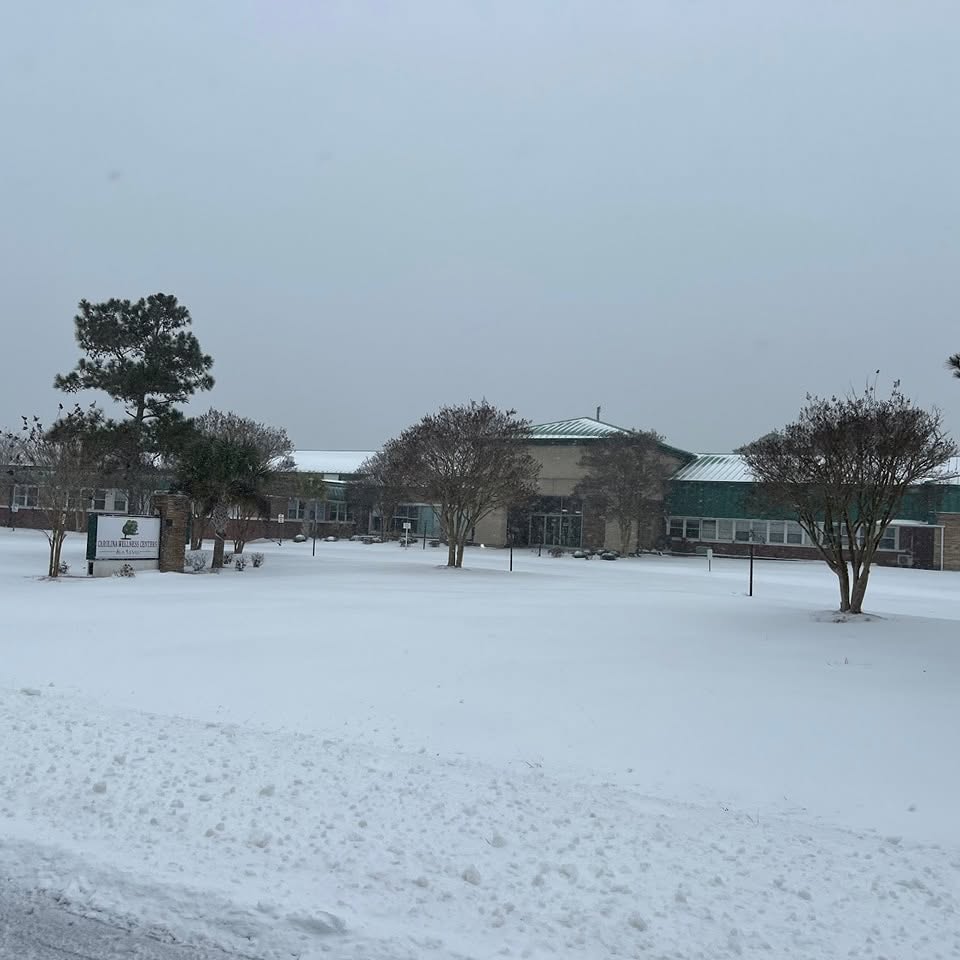 The actual Carolina Wellness Centers hospital building at Sea Level after snowfall